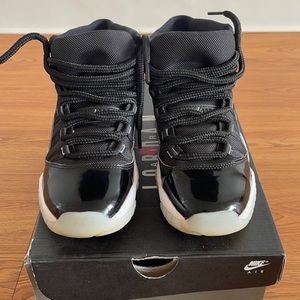 Air Jordan 11 Retro black in size 6.5Y